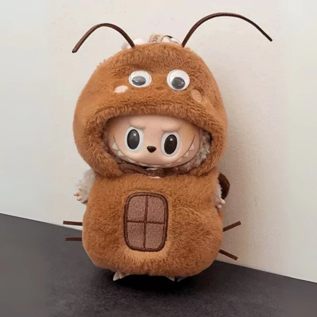 Cockroach Plush Costume on 17cm plush doll: brown plush cockroach full-body costume, oversized googly eyes on hood.