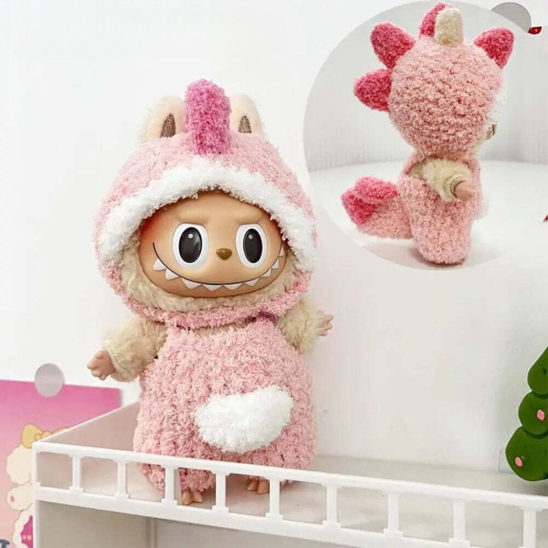 Pink Dino Plush Costume on 17cm plush doll: one-piece pink sherpa dino costume with hood, darker pink plush dino spines al...