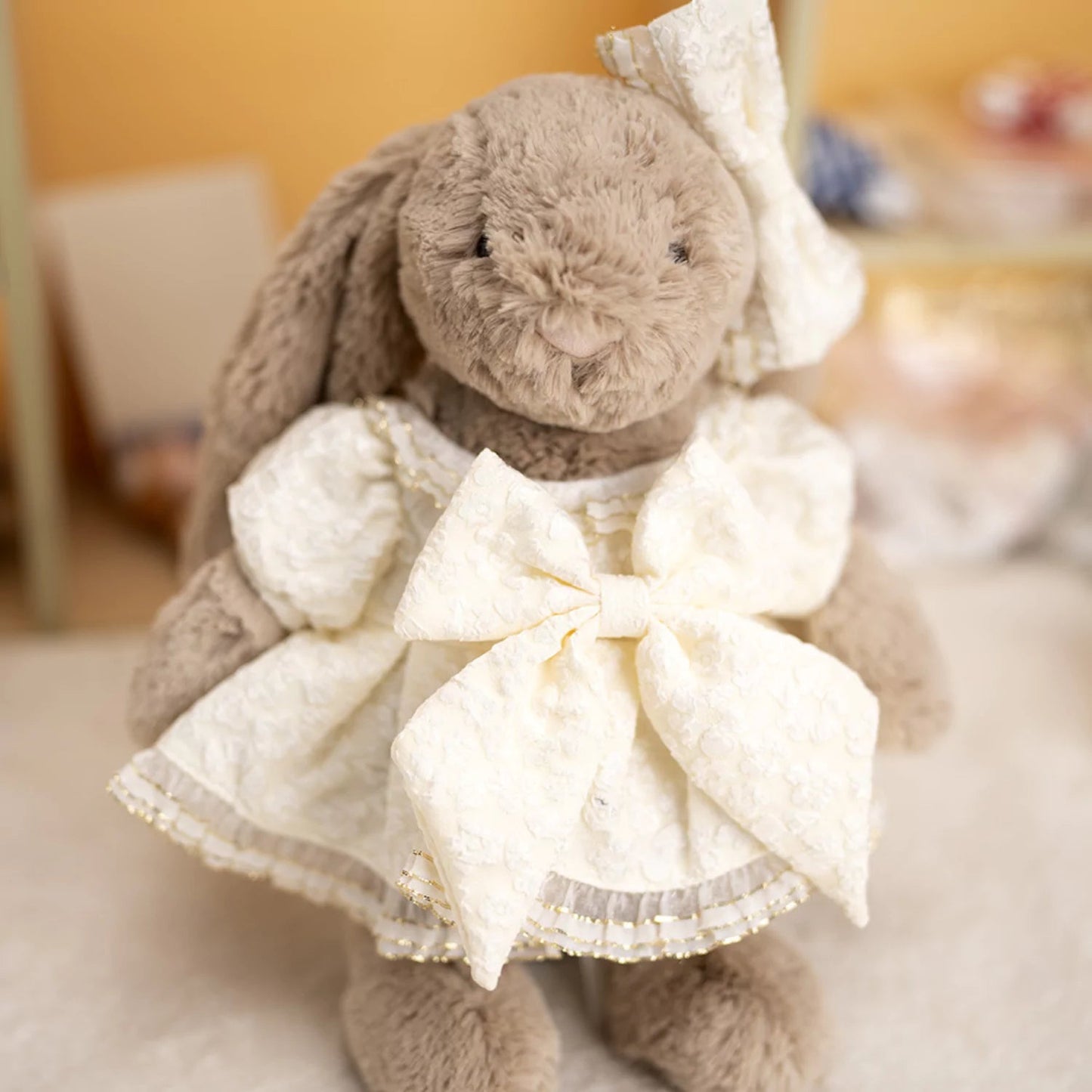 Lace Bow Dress on 31cm plush rabbit: white lace dress with intricate floral texture pattern throughout, oversized ivory la...