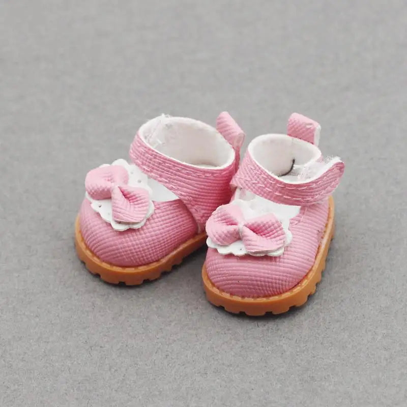 Pink Bow-Knot Mary Shoes on 17cm plush doll: pair of pink bow-knot shoes, features white lace-trimmed bows.