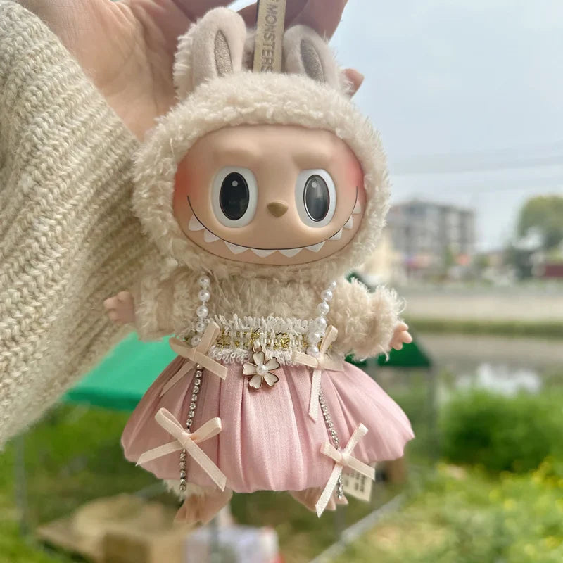 Princess Pink Tulle Outfit on 17cm plush doll: cream sherpa hooded top with bunny-ear detail, dusty pink pleated tulle ski...