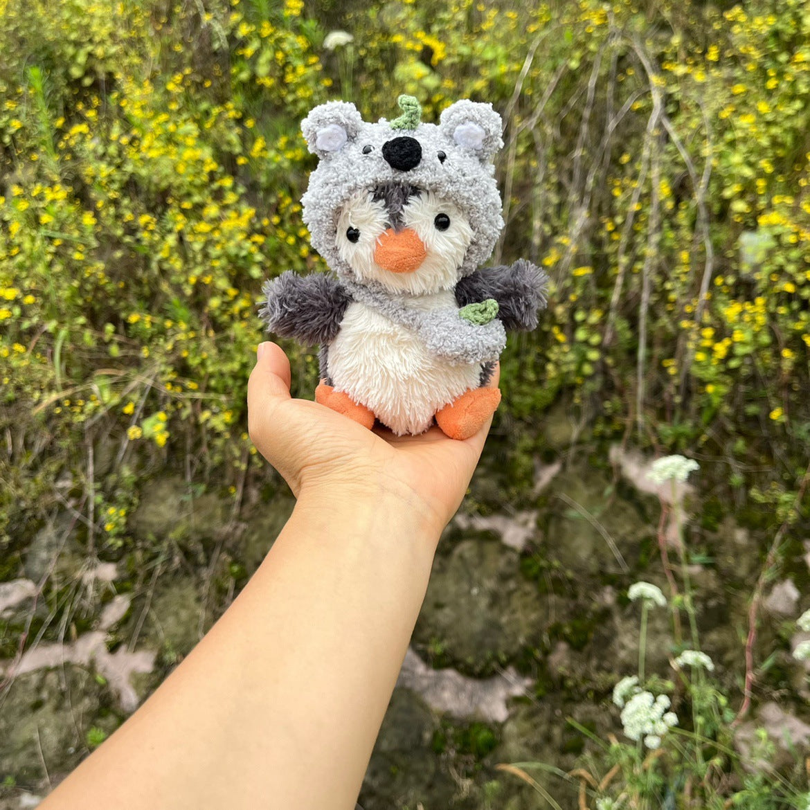 Koala Hat Outfit on 15cm plush penguin: hand-crocheted koala hat with fluffy oversized ears, mini green eucalyptus leaf ac...