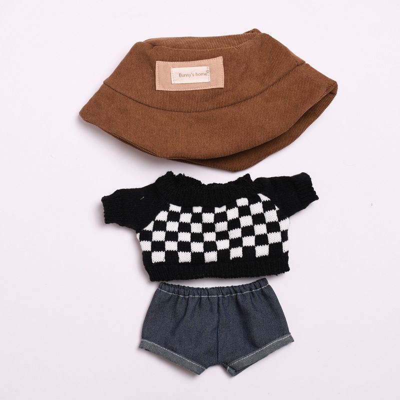 Checker Knit Sweater on 38cm plush doll: cream-white cable-knit beanie with smiley face patch, cream knit pullover sweater.