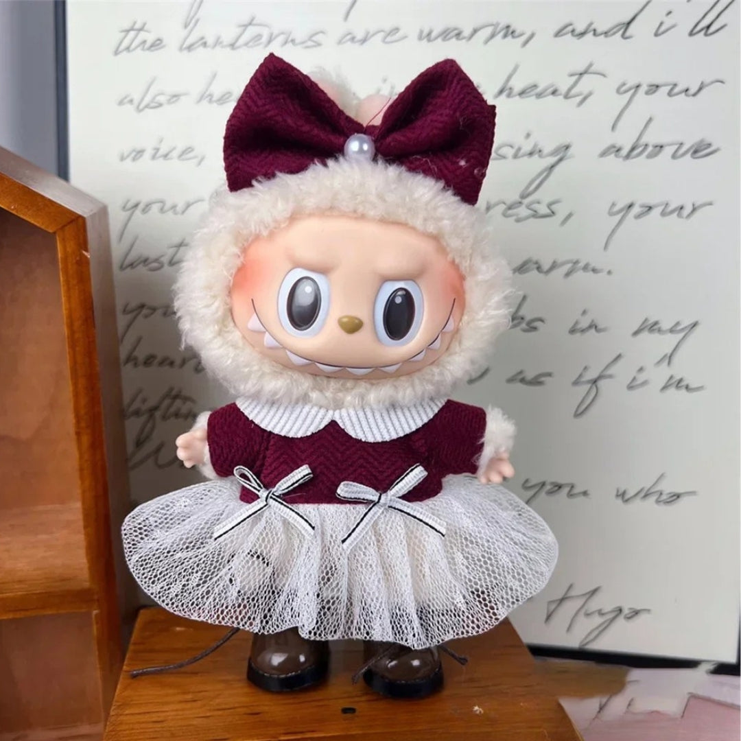 Burgundy Royalty Dress on 17cm plush doll: burgundy herringbone-textured bodice with white knit collar trim, white tulle t...