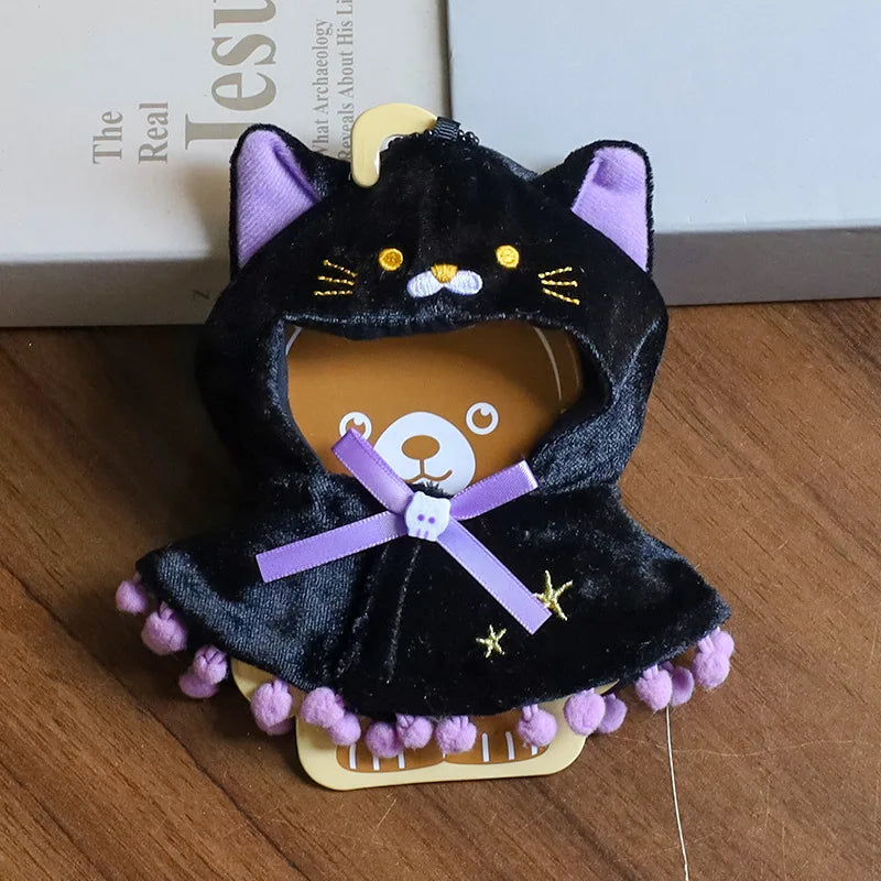 Cat Cape Outfit on 17cm plush doll: black velvet cat cape with hood, embroidered cat face hood with purple inner ears.