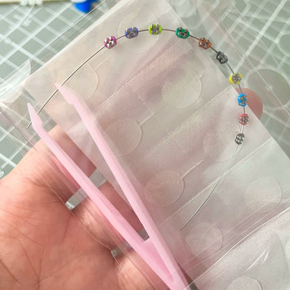 Handmade mini steel teeth braces for Labubu doll - colorful beaded wire accessory