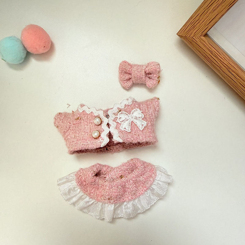 Pink Tweed Bow Set on 17cm plush doll: pink tweed top with white lace bow detail and pearl buttons, matching pink tweed sk...