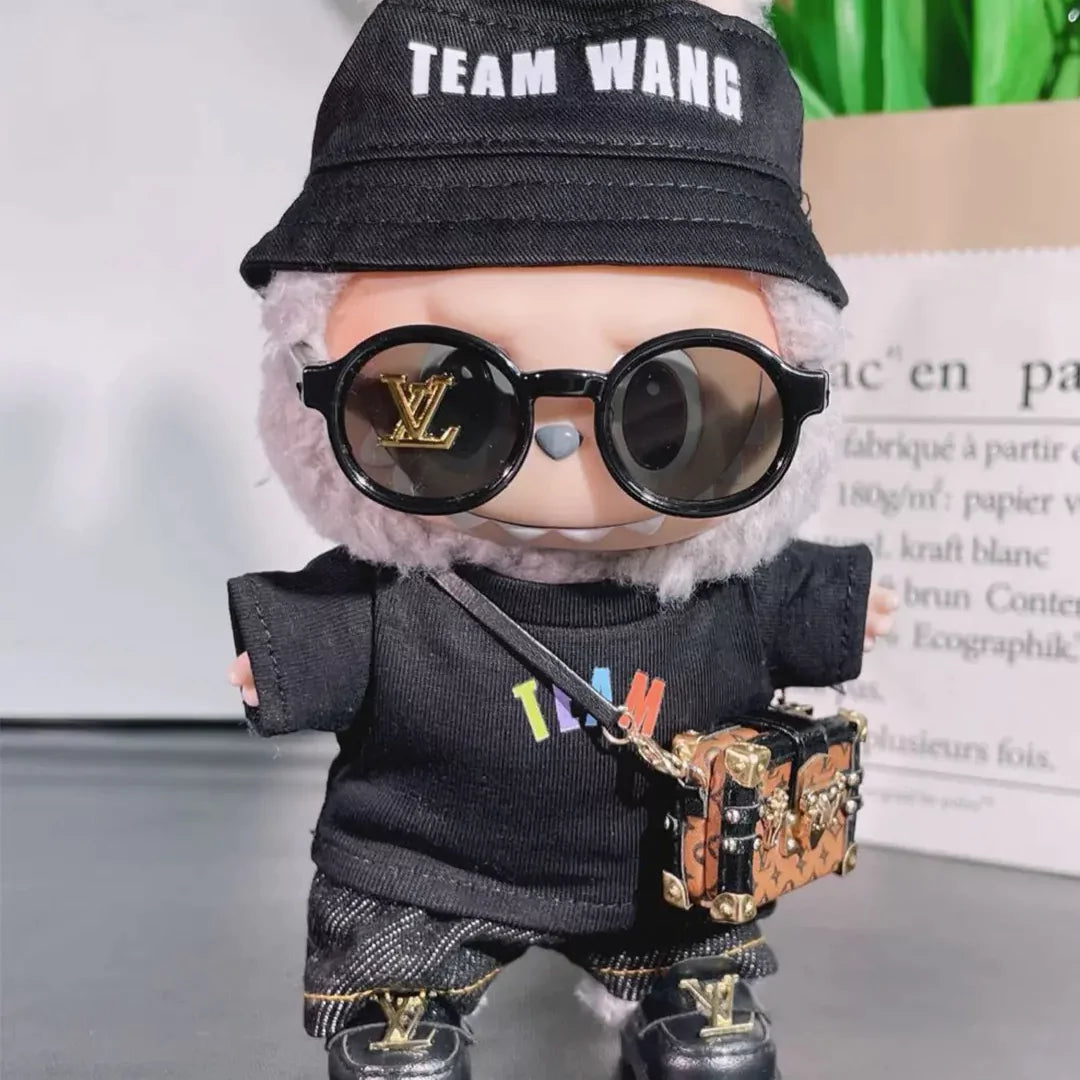 Handmade all black celebrity-inspired streetwear outfit for Labubu - bucket hat, sunglasses, and crossbody bag