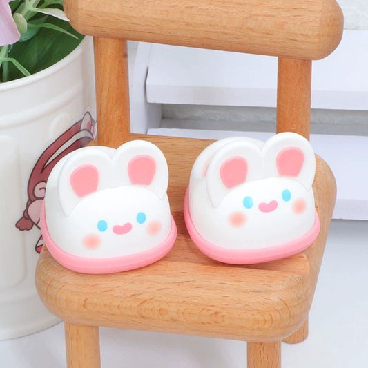 Pink Bunny Face Slippers on 17cm plush doll: pair of bunny face mini slippers, color: pink and white with blue eye accents.