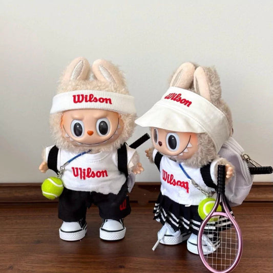 Tennis Player Outfit on 17cm plush doll: white athletic top with red logo-style lettering, dark athletic shorts or skirt.