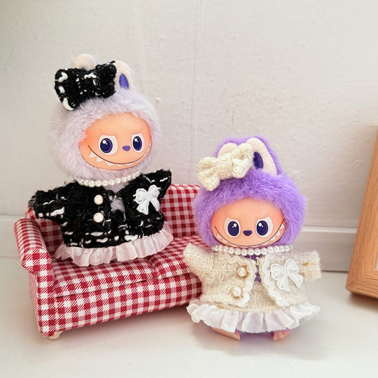 Ivory Tweed Bow Outfit on 17cm plush doll: black tweed jacket with pearl strand necklace, cream ivory tweed dress with lac...