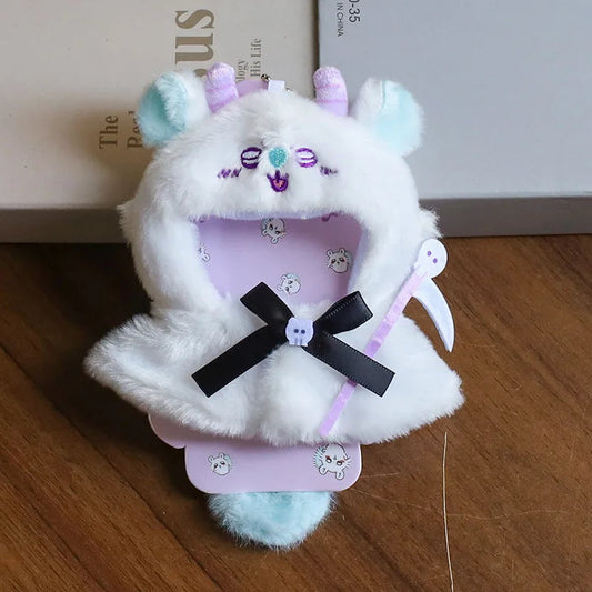Monster Cape Outfit on 17cm plush doll: white plush faux-fur monster cape with hood, embroidered monster face with sparkly...