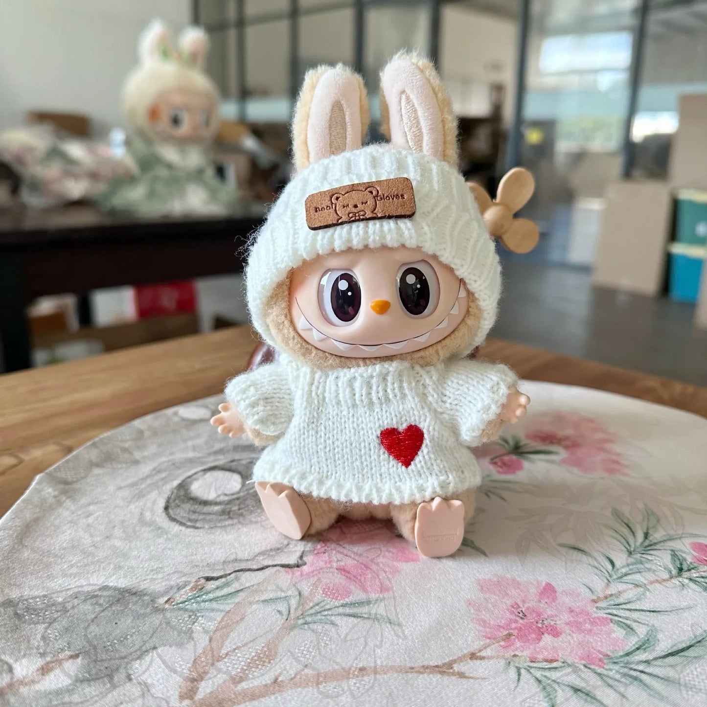 Cream Knit Heart Sweater on 17cm plush doll: cream cable-knit sweater dress, embroidered red heart on front.