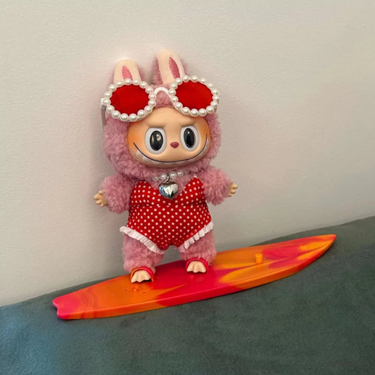 Polka Dot Outfit on 17cm plush doll: red and white polka dot one-piece swimsuit with ruffle trim, pearl-rimmed red-lens su...
