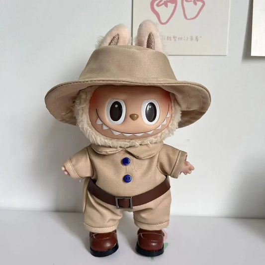 Safari Explorer Outfit on 17cm plush doll: khaki cotton explorer jumpsuit with navy blue buttons, brown faux-leather belt...