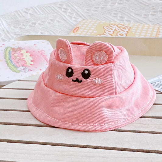Pink Bunny Ear Hat on 17cm plush doll: soft pink cotton twill bucket hat with structured brim and bunny ear design, embroi...
